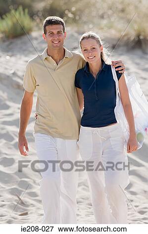Couple on beach View Large Photo Image Stock Photo - Couple on beach. Fotosearch