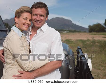 Couple on safari View Large Photo Image Stock Photo - Couple on safari. Fotosearch