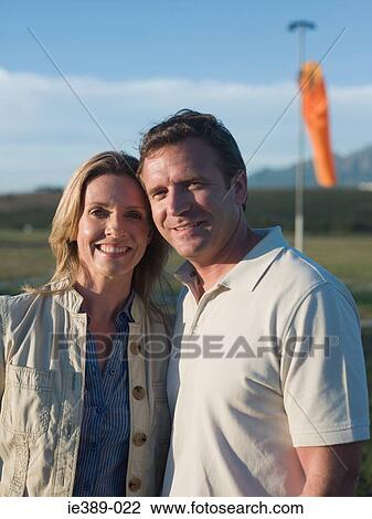 Stock Image - Couple outdoors. Fotosearch