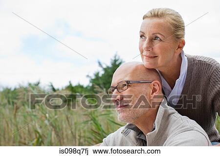 Stock Image - Couple outdoors. Fotosearch