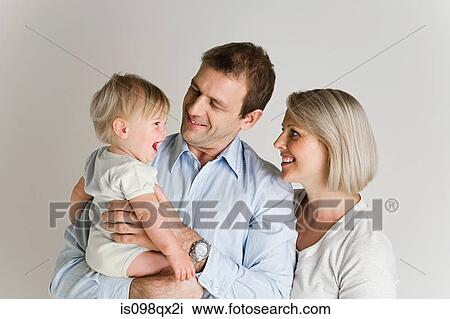 Couple with baby View Large Photo Image Stock Image - Couple with baby. Fotosearch