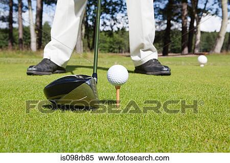 Stock Photography - Cropped image of a golfer. Fotosearch