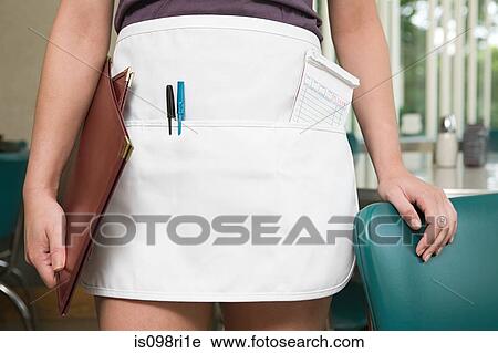 Cropped image of a waitress View Large Photo Image Stock Image - Cropped image of a waitress. Fotosearch