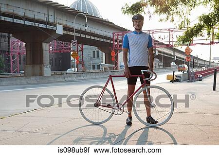 Stock Image - Cyclist in brooklyn. Fotosearch