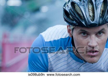 Picture - Cyclist looking determined. Fotosearch