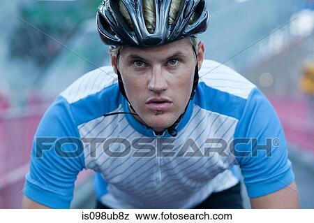Cyclist looking determined View Large Photo Image Stock Photo - Cyclist looking determined. Fotosearch
