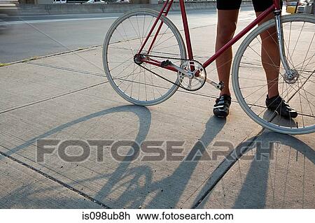 Cyclist with bike View Large Photo Image Stock Image - Cyclist with bike. Fotosearch