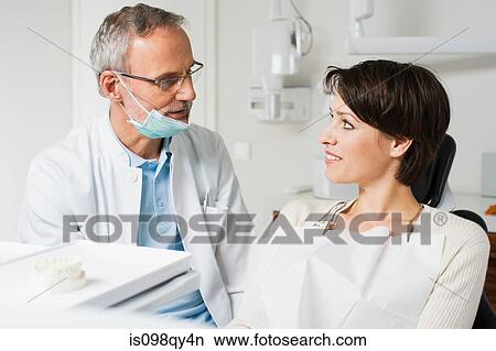 Dentist and patient View Large Photo Image Picture - Dentist and patient. Fotosearch