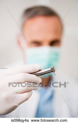 Dentist with drill View Large Photo Image Stock Image - Dentist with drill. Fotosearch