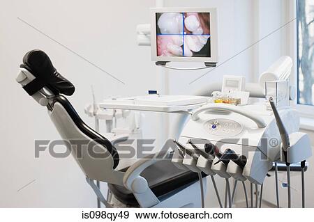 Stock Photo - Dentists chair and equipment. Fotosearch