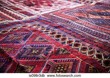 Design on rug in market View Large Photo Image Stock Image - Design on rug in market. Fotosearch