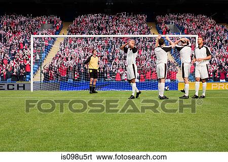 Disappointed football players View Large Photo Image Stock Photograph - Disappointed football players. Fotosearch