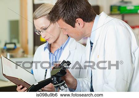 Doctors in laboratory View Large Photo Image Stock Photograph - Doctors in laboratory. Fotosearch