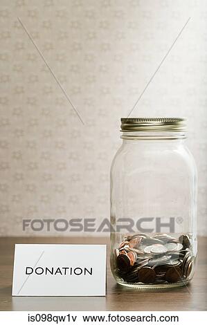 Donation jar View Large Photo Image Stock Photo - Donation jar. Fotosearch