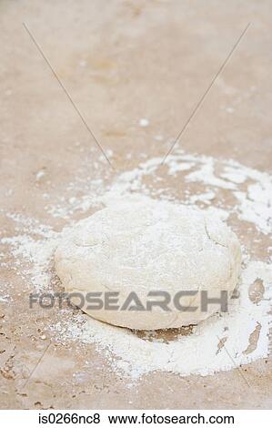 Dough and flour View Large Photo Image Stock Photo - Dough and flour. Fotosearch