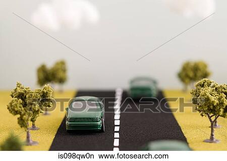 Electric cars on road View Large Photo Image Picture - Electric cars on road. Fotosearch