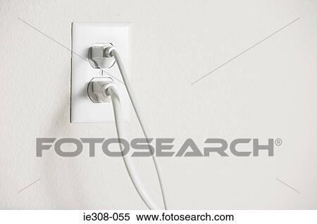 Stock Photography - Electrical plug in a socket. Fotosearch