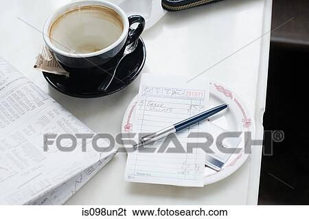 Empty cup and check in cafe View Large Photo Image Stock Photograph - Empty cup and check in cafe. Fotosearch