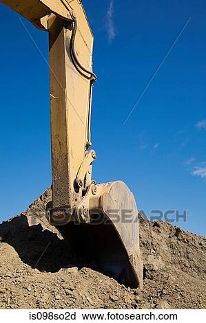 Excavator and soil View Large Photo Image Stock Image - Excavator and soil. Fotosearch