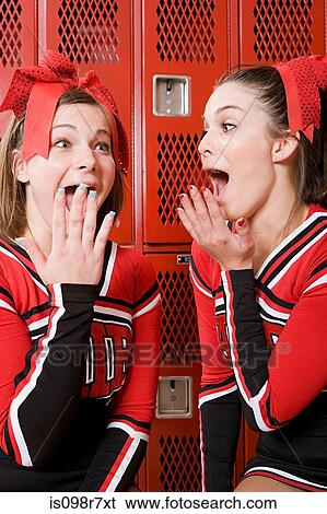 Stock Photograph - Excited cheerleaders. Fotosearch