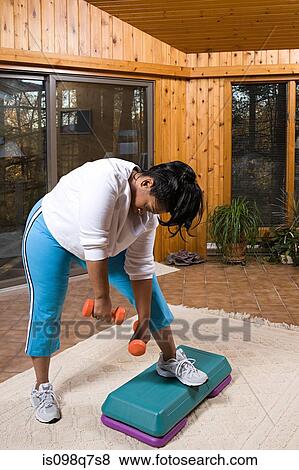 Exhausted woman exercising View Large Photo Image Stock Photo - Exhausted woman exercising. Fotosearch