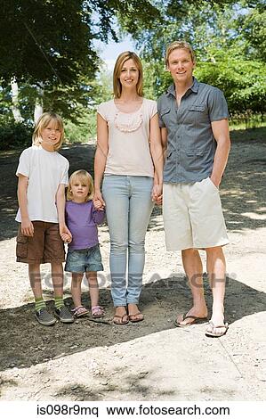 Stock Photography - Family at forest. Fotosearch