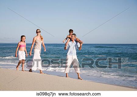 Family at the beach View Large Photo Image Picture - Family at the beach. Fotosearch
