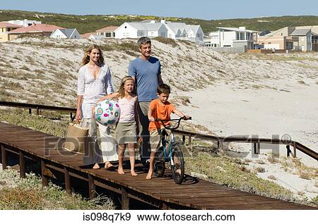 Stock Photo - Family at the coast. Fotosearch