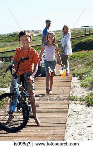 Family at the coast View Large Photo Image Stock Photograph - Family at the coast. Fotosearch