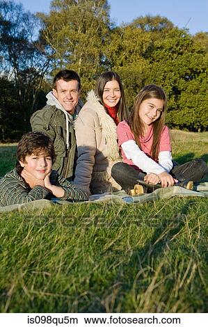 Family in park View Large Photo Image Picture - Family in park. Fotosearch