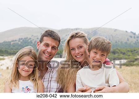 Stock Image - Family outdoors. Fotosearch