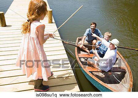 Family with rowing boat View Large Photo Image Stock Photography - Family with rowing boat. Fotosearch