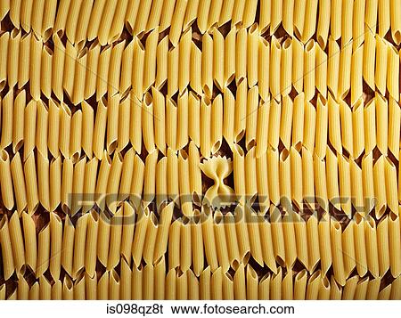 Farfalle and penne pasta View Large Photo Image Stock Photograph - Farfalle and penne pasta. Fotosearch