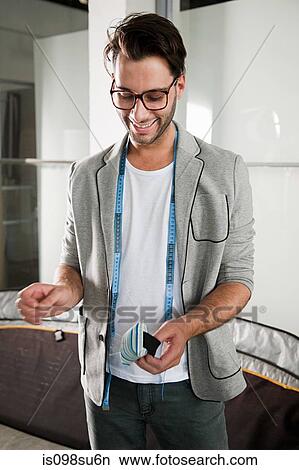 Picture - Fashion designer at work. Fotosearch