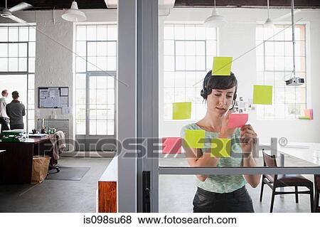 Fashion designer at work View Large Photo Image Stock Photo - Fashion designer at work. Fotosearch