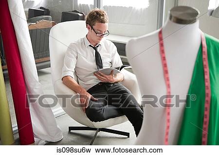 Fashion designer at work View Large Photo Image Stock Photo - Fashion designer at work. Fotosearch