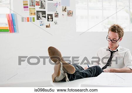 Fashion designer at work View Large Photo Image Stock Photograph - Fashion designer at work. Fotosearch