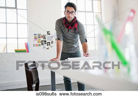 Fashion designer at work View Large Photo Image Stock Photograph - Fashion designer at work. Fotosearch