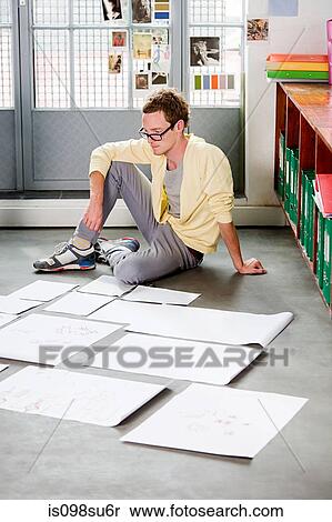 Stock Photography - Fashion designer at work. Fotosearch