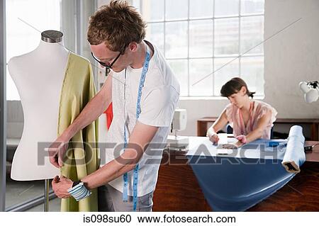 Fashion designers at work View Large Photo Image Stock Image - Fashion designers at work. Fotosearch