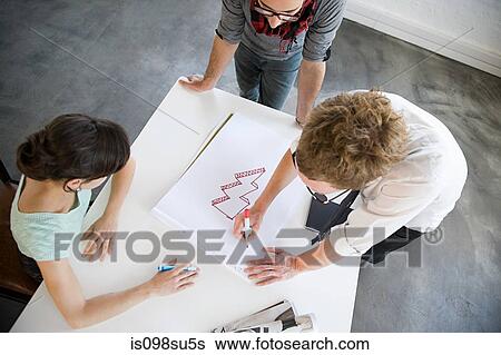 Fashion designers at work View Large Photo Image Stock Photograph - Fashion designers at work. Fotosearch