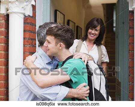 Stock Photo - Father and son hugging. Fotosearch