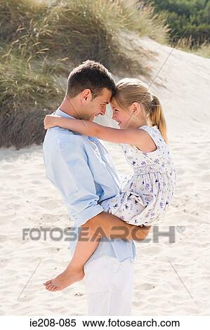 Father carrying daughter View Large Photo Image Stock Photography - Father carrying daughter. Fotosearch