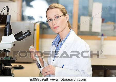 Female doctor in laboratory View Large Photo Image Stock Photo - Female doctor in laboratory. Fotosearch