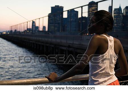 Female runner by river View Large Photo Image Stock Photography - Female runner by river. Fotosearch