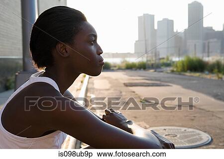 Female runner looking away View Large Photo Image Stock Photography - Female runner looking away. Fotosearch
