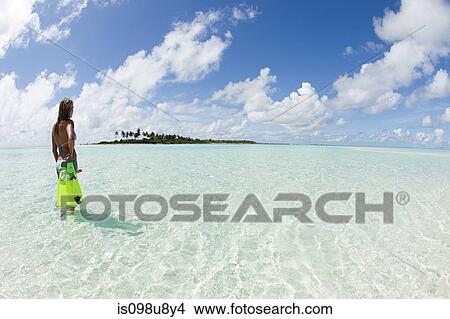 Female snorkeler on Kadhdhoo Island, Laamu Atoll, Maldives View Large Photo Image Picture - Female snorkeler on Kadhdhoo Island, Laamu Atoll, Maldives. Fotosearch