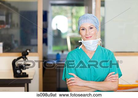 Female surgeon in scrubs View Large Photo Image Stock Photograph - Female surgeon in scrubs. Fotosearch