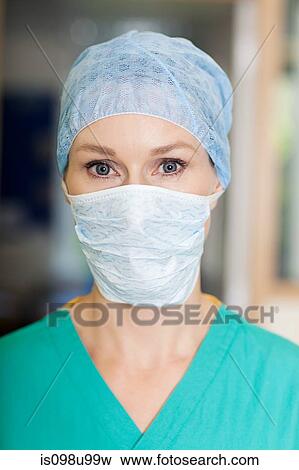 Female surgeon wearing mask View Large Photo Image Stock Photo - Female surgeon wearing mask. Fotosearch