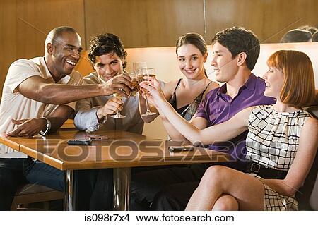 Five friends in a bar View Large Photo Image Picture - Five friends in a bar. Fotosearch